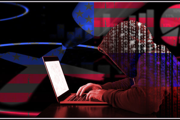 zero day threats from russian aligned cybercriminals represented b a hacker in a dark hoodie on a laptop overlaid by a glowing Russian flag.