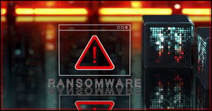 a small digital screen shows a triangular caution sign wheile the word ransomware appears below it in grey on a background of yellow and red digital screens