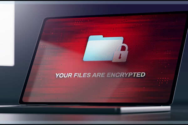 a laptop screen showing a message telling the user that their files have been encrypted