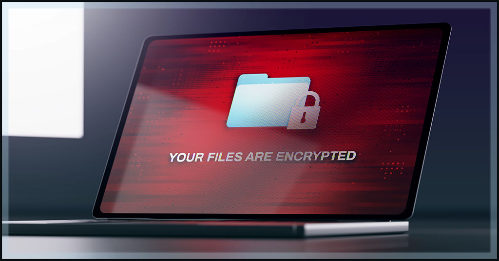 a laptop screen showing a message telling the user that their files have been encrypted